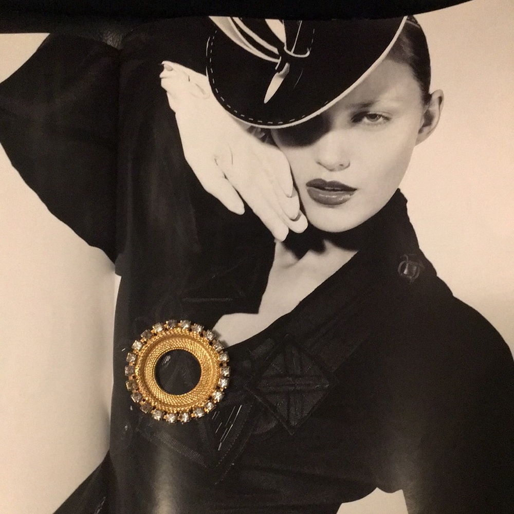 Beautiful mesh gold brooch with clear rhinestones